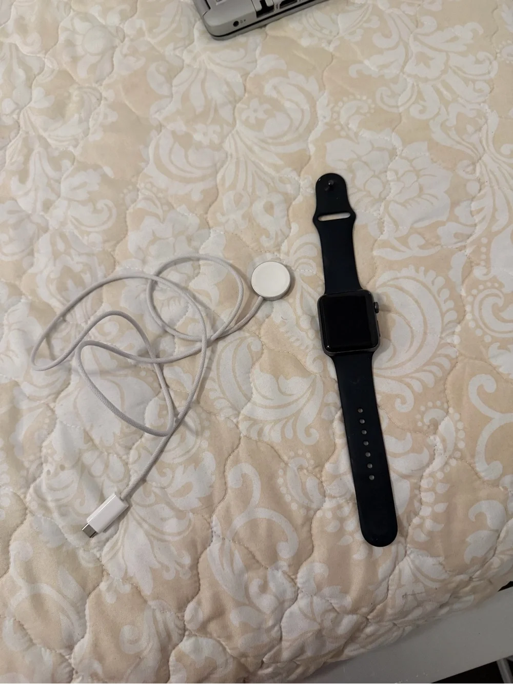 Apple Watch with black Silicone Band and Magnetic Charger. Used